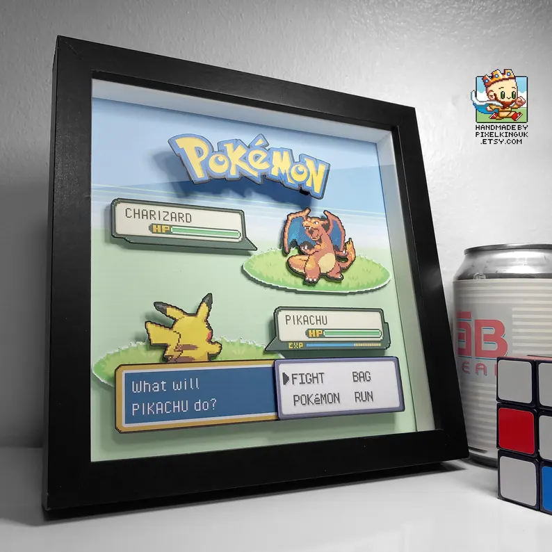 Black framed personalised Pokémon battle shadow box with two chosen characters in a layered Game Boy Advance style scene