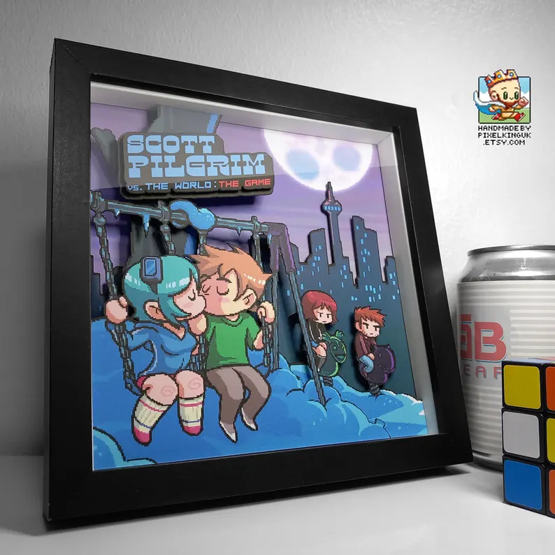 Black-framed Scott Pilgrim vs. The World game pixel art shadow box