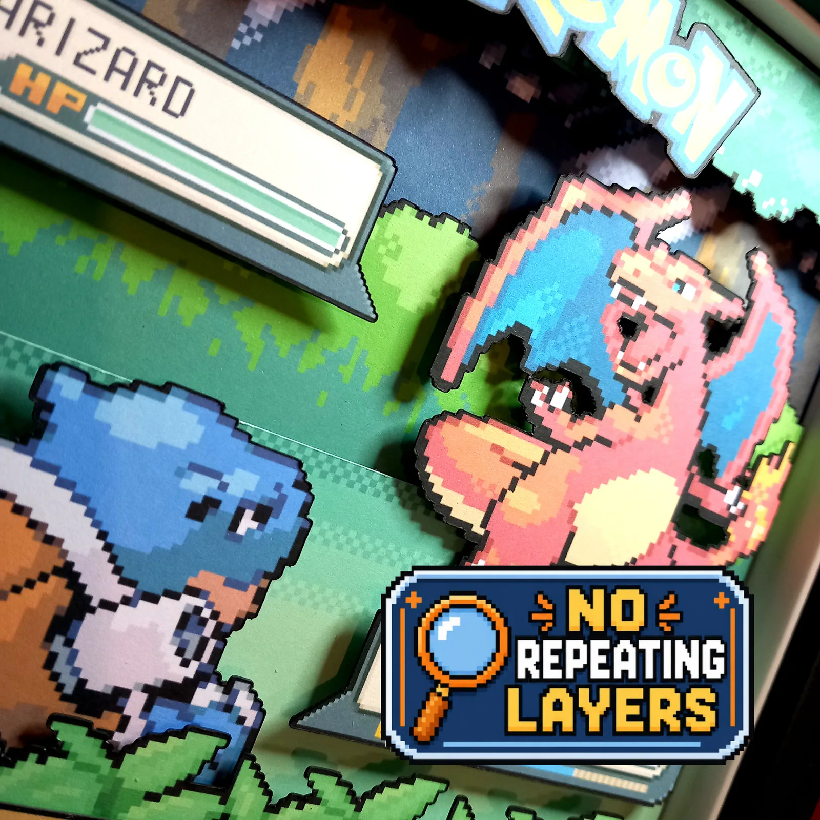 Close-up of separate cardstock layers in a custom Pokémon shadow box, showing Charizard, Blastoise and raised battle panels.