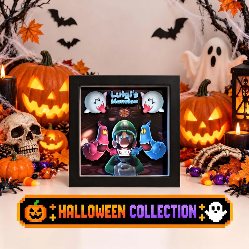 Luigi's Mansion layered shadow box displayed with pumpkins and Halloween decorations as seasonal gaming decor.